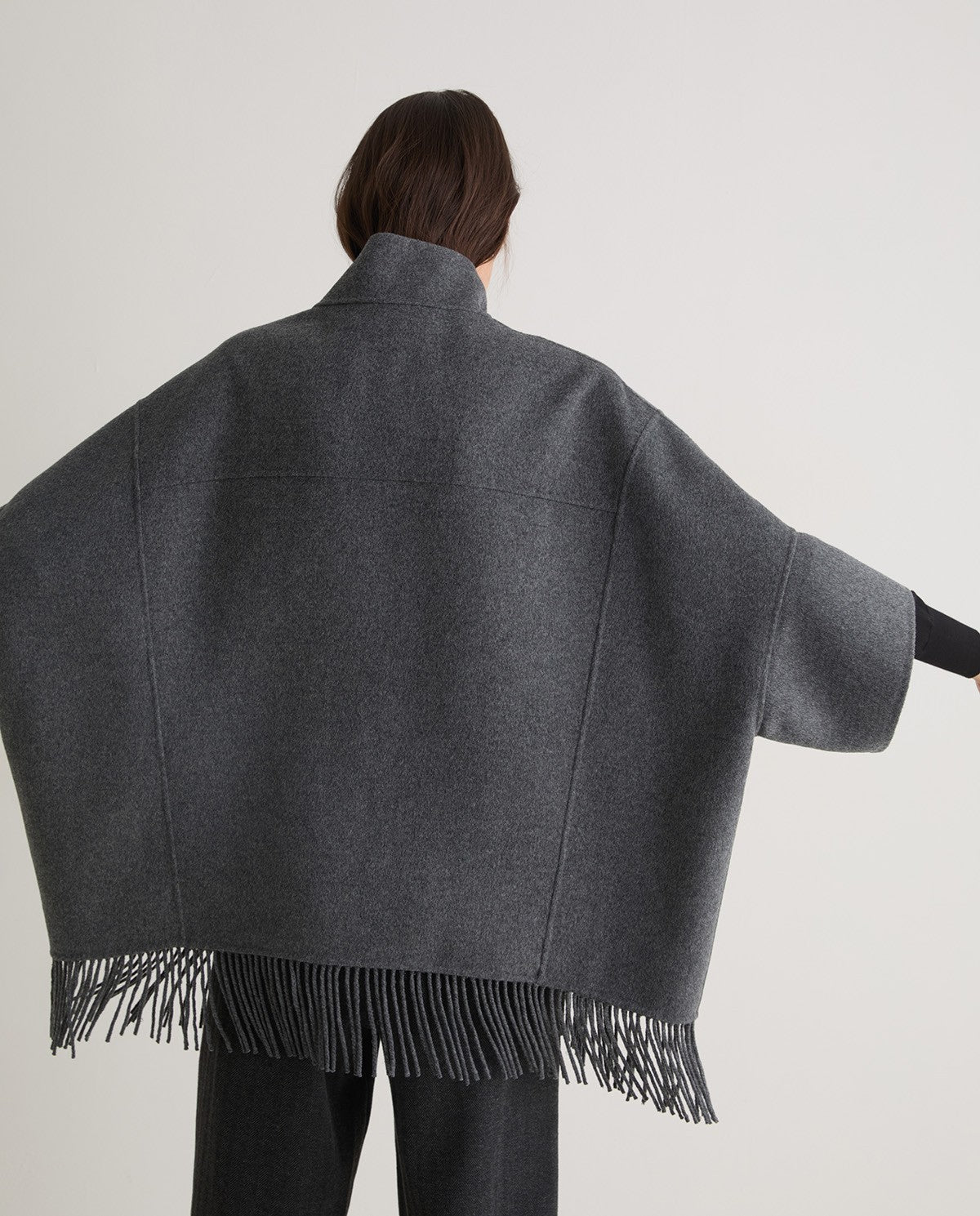 Handmade wool-blend fringed cape - AVAILABLE IN BLACK