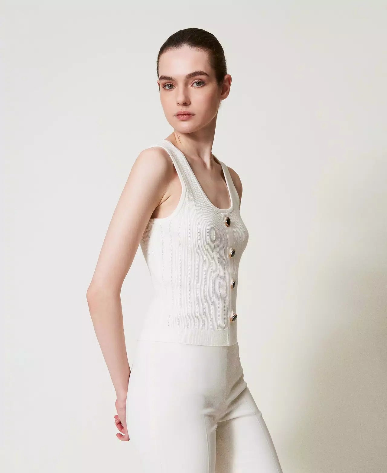 Knit top with decorative buttons