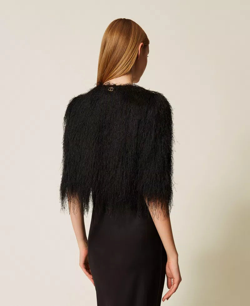 Cropped jacket with fringes