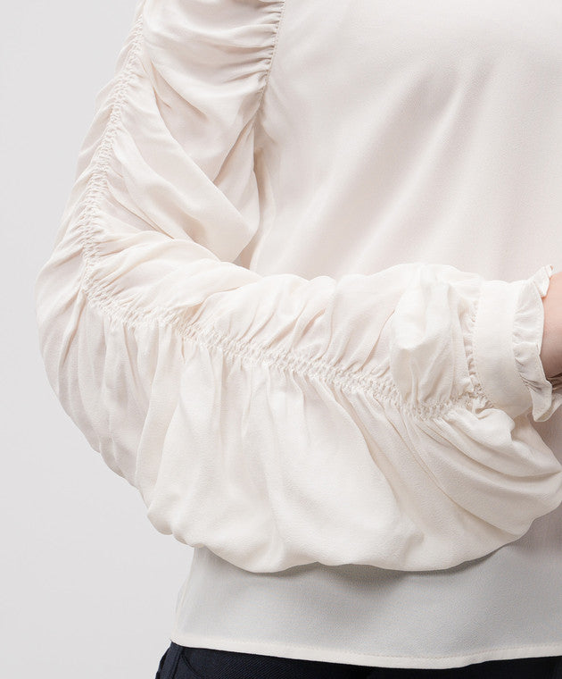 Blouse with gathering