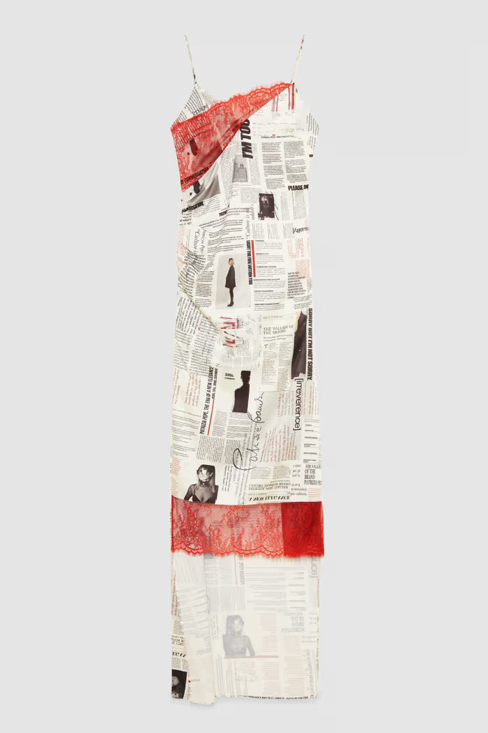 Newspaper dress with asymmetrical lace