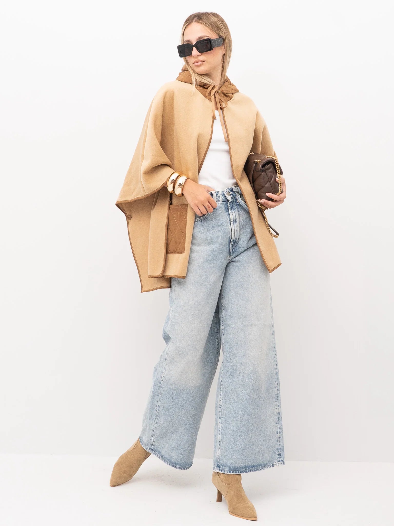 Knit poncho with pockets